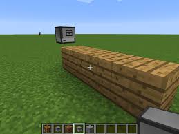 Minecraftのゲーム画面。ブロックでできた世界が広がっている。